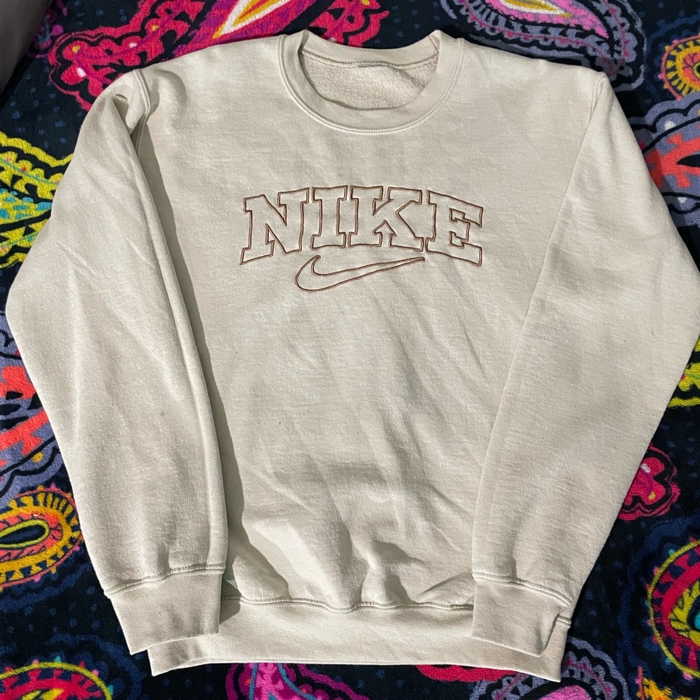 Women’s tan Nike crewneck